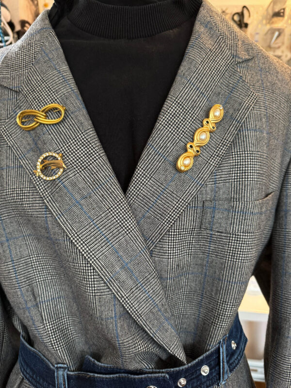 Brooches on blazer